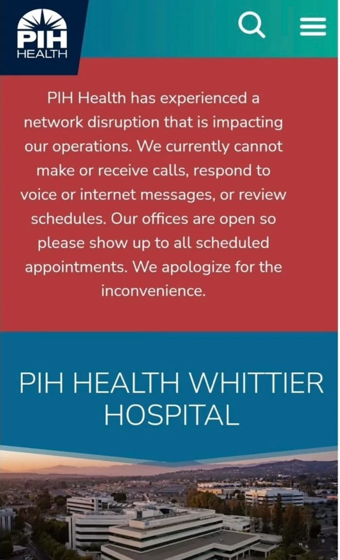 A notice from PIH Health Whittier Hospital about a network disruption affecting calls, messages, and schedules, with a view of the hospital in the background.