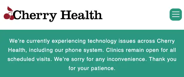 Screenshot of a Cherry Health website notice stating that technology issues are affecting the organization, including its phone system.