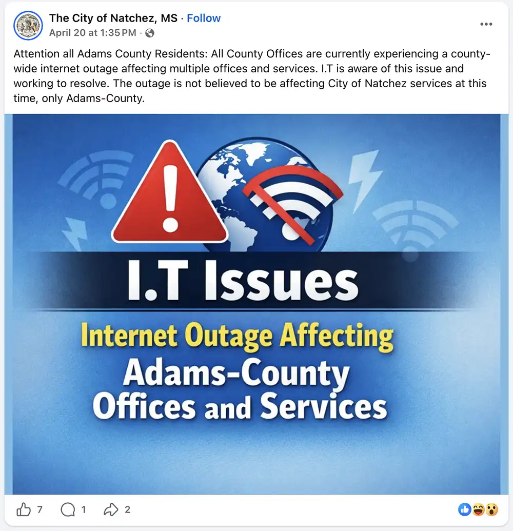 Screenshot of a City of Natchez Facebook post warning of an internet outage affecting Adams County offices and services.