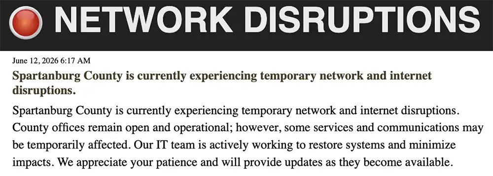 Screenshot of a Spartanburg County “Network Disruptions” notice saying the county is experiencing temporary network and internet disruptions while offices remain open.